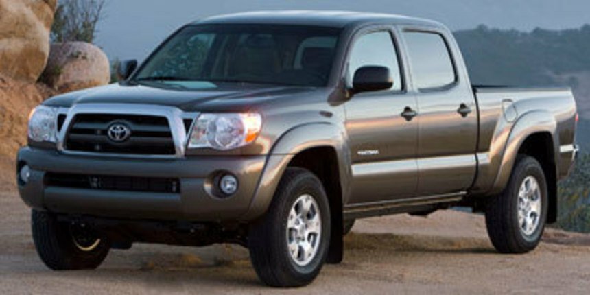 2010 second-gen Toyota Tacoma. Classic design with reliable towing capacity.