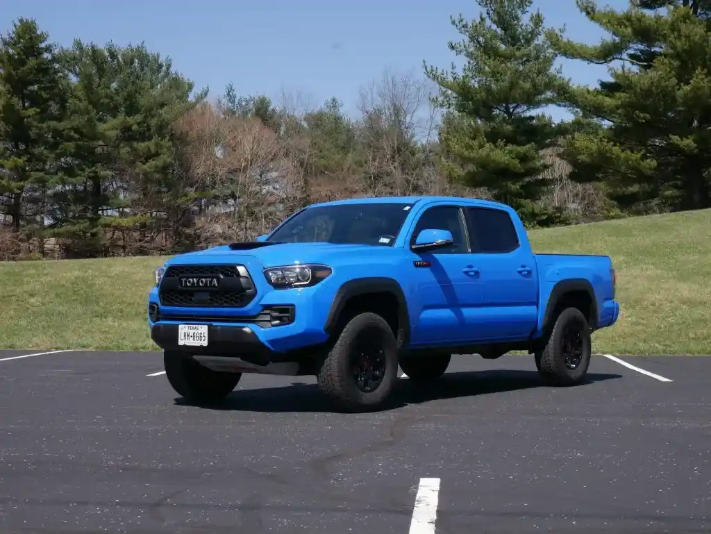Blue 2019 Toyota Tacoma TRD pickup truck, a highly recognizable model from the modern Toyota Tacoma years lineup.