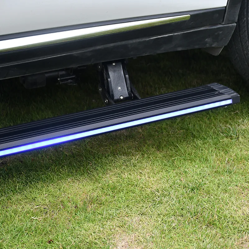 Close-up detail of the robust mechanical arm and LED strip on gmc sierra 1500 running boards.