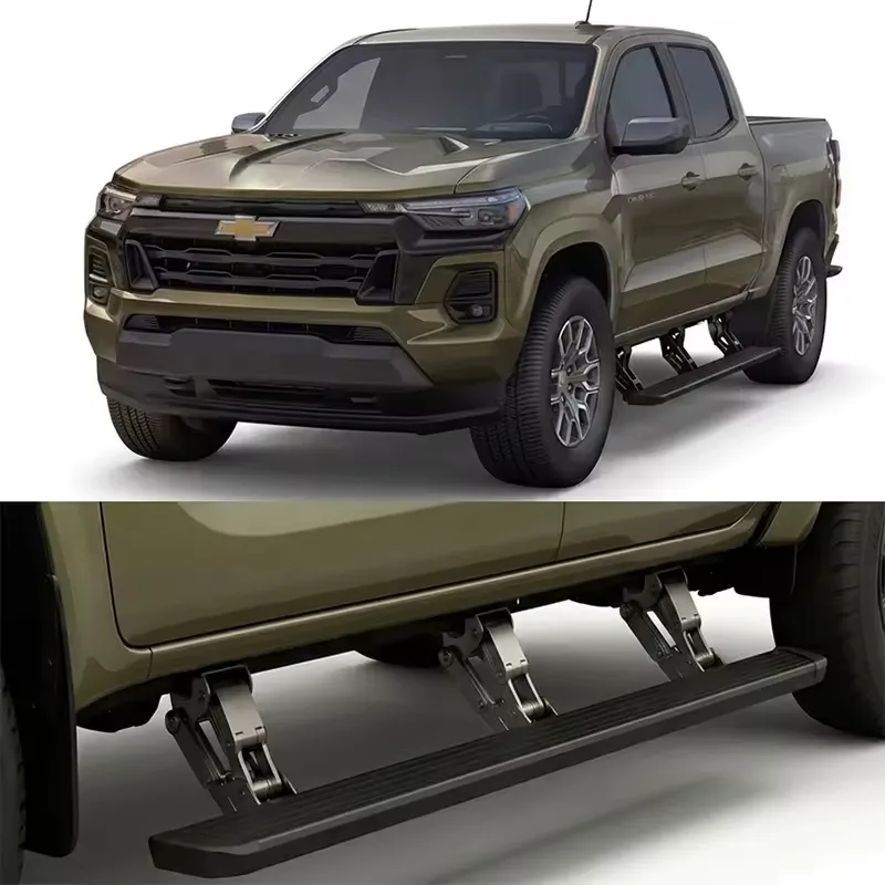 A close-up view of motorized chevy colorado running boards in the fully extended position on a green truck.