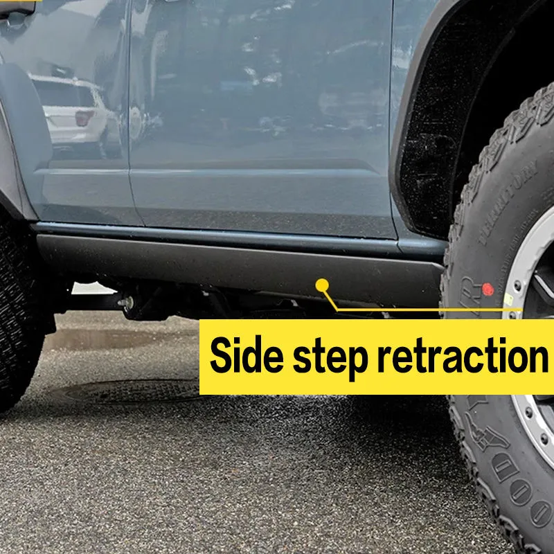 Close-up of the vehicle body showing side step retraction mechanism of ford bronco running boards.