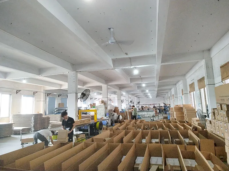 Corrugated cardboard production line in a workshop, manufacturing boxes for import power running boards.