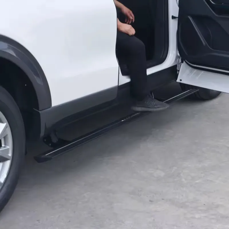 Person stepping on the heavy-duty Nissan Patrol running boards to demonstrate durability