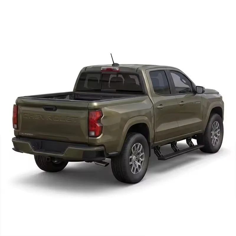 Rear three-quarter view of a green Chevy Colorado pickup truck equipped with running boards.