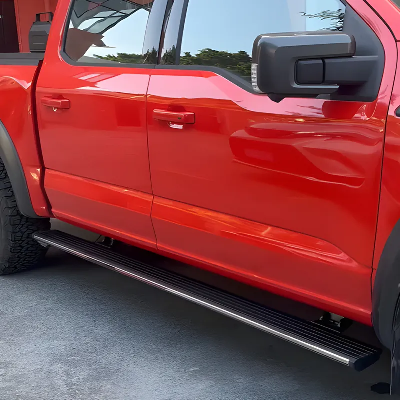 Side view of a red pickup truck showing the clean appearance of retracted f150 running boards.