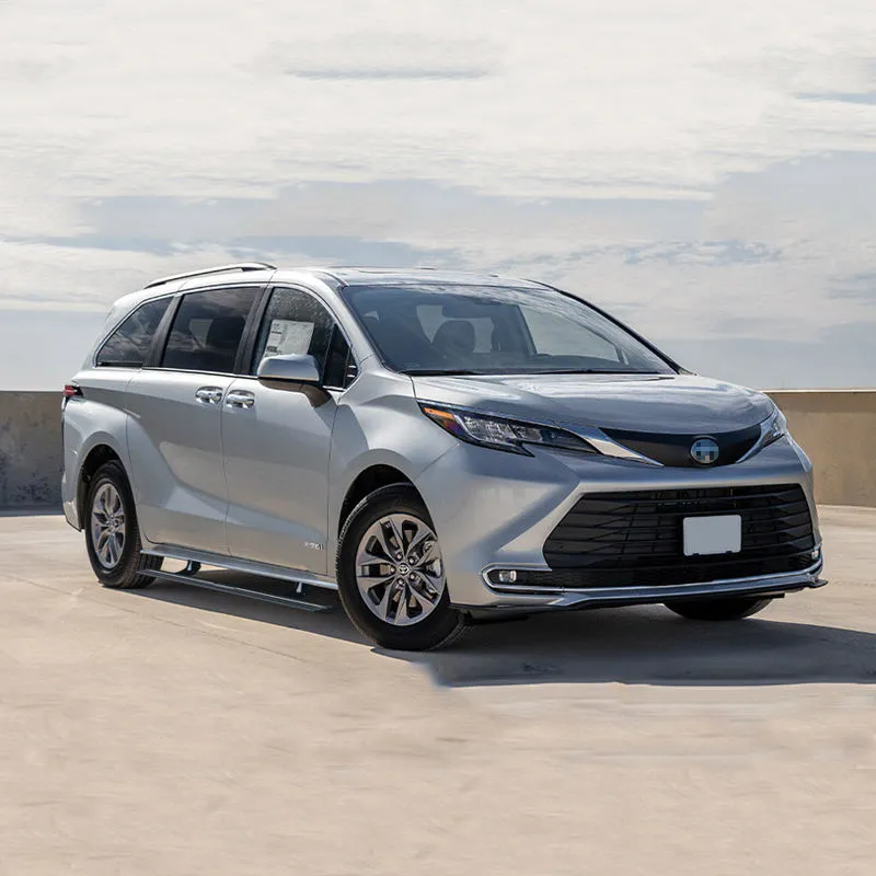 Silver Toyota Sienna equipped with deployed Toyota Sienna running boards.