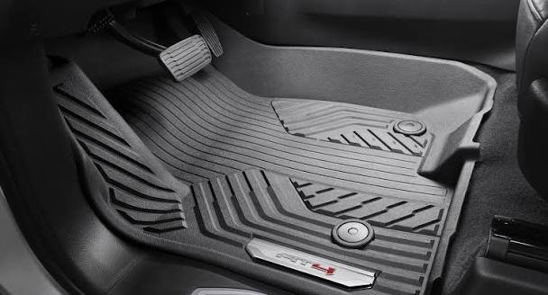 Custom fit black rubber floor mat with GMC logo, a top pick for best truck accessories to keep your vehicle's carpet clean.