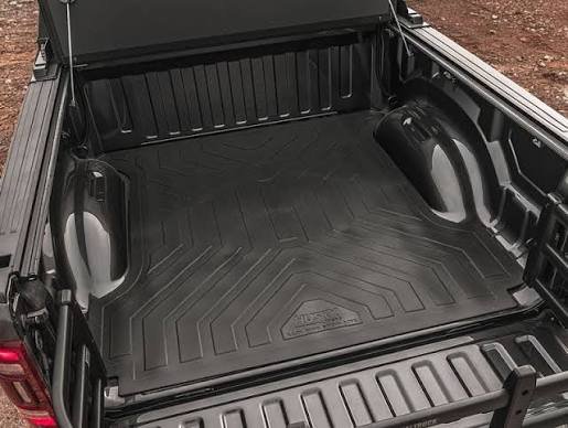 Durable black all-weather truck bed liner with a non-slip surface, a top-tier choice among the best truck accessories for cargo protection.