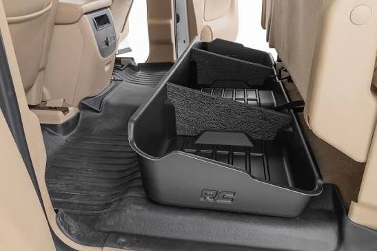 Custom-fit under-seat truck organizer with sliding dividers, a top-tier selection among the best truck accessories for secure and neat rear cabin storage.