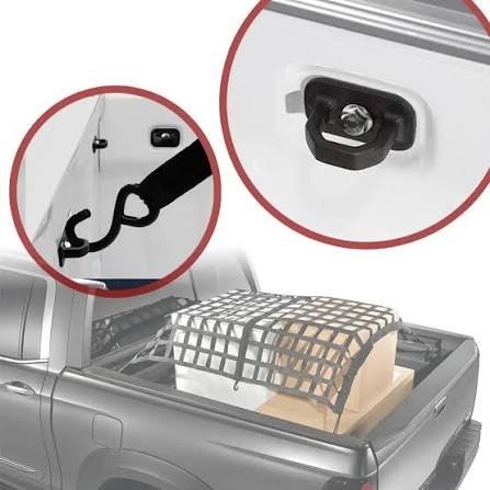 Durable truck bed anchor points and tie-down rings used with a cargo net to secure boxes, a top-tier choice among the best truck accessories for load management.