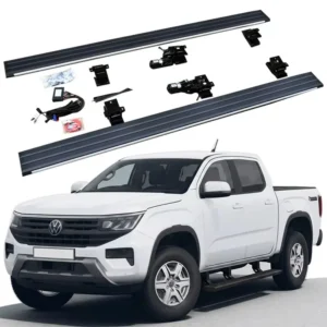 A complete product kit of AMAROK electric side steps displayed above a white pickup truck, including running boards, motors, mounting brackets, and wiring harness.