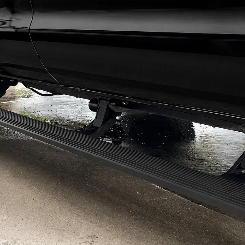 Low-angle close-up of a deployed BYD Shark 6 Electric Side Step under an open door, showcasing the water-resistant motor, folding linkage mechanism, and step illumination on a wet driveway.