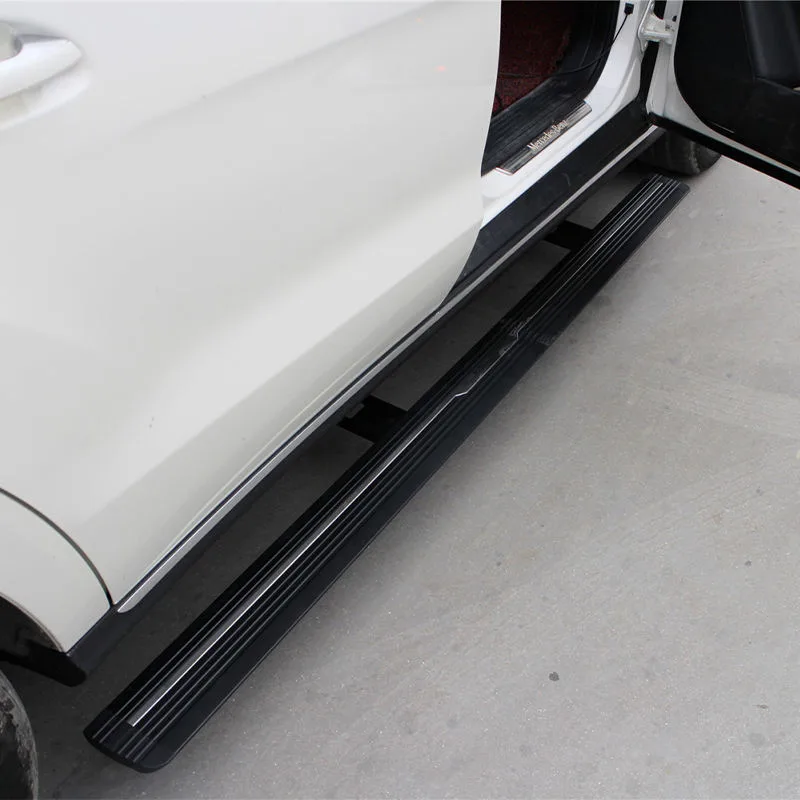 Close-up view of a retracted Mercedes-Benz GL Electric Running Board tucked beneath the open door of a white vehicle, showcasing the textured anti-slip surface.