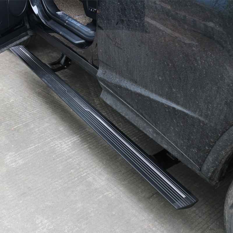 Lexus rx350 electric running boards deployed on a black SUV with the driver side front door open
