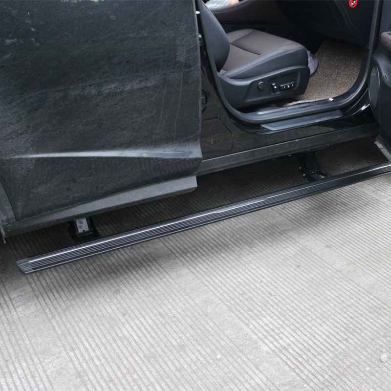 Lexus rx350 electric running boards extended on a black SUV with the rear passenger door open, showing the interior seat.
