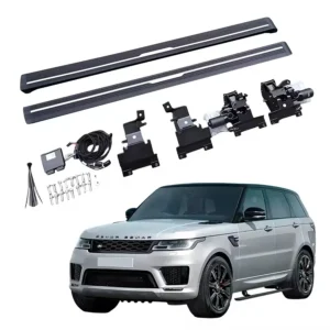 Complete installation kit for Range Rover Vogue electric side steps, including motors, wiring harness, control module, and mounting brackets, shown with a silver Range Rover.