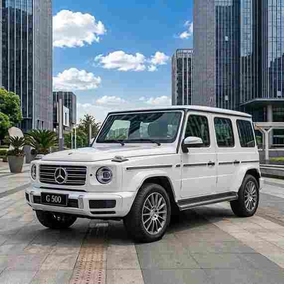 White Mercedes-Benz G 500 off-roader parked in an urban area with mercedes-benz-electric-running-boards.