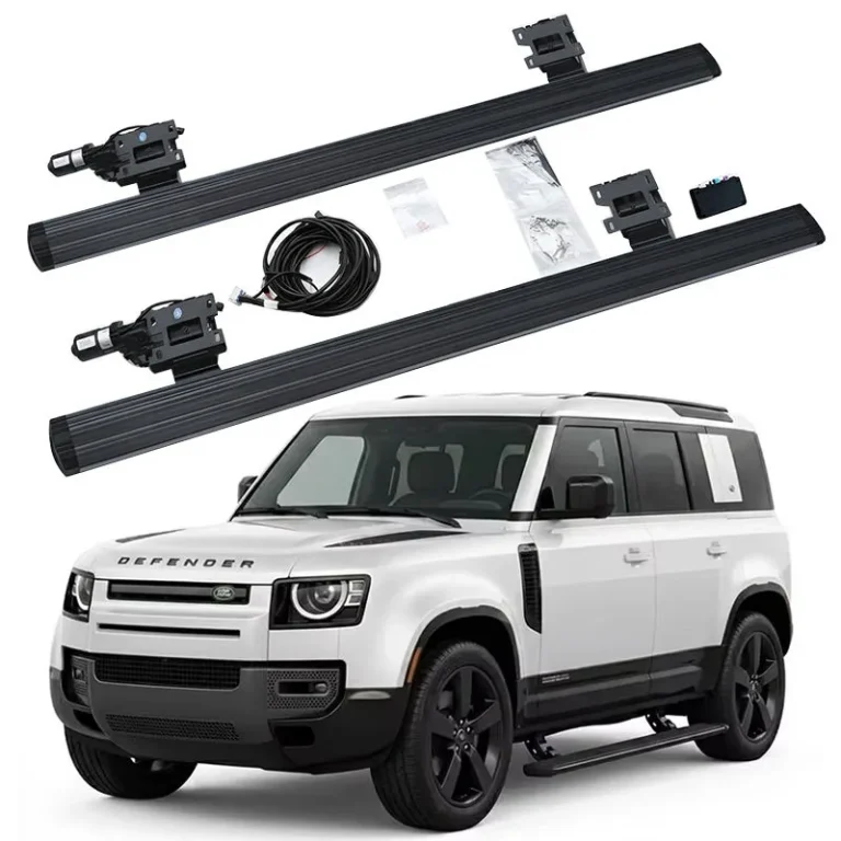 Defender 130 Electric Side Steps complete kit with running boards, motors, mounting brackets, wiring harness, and control module, shown with a white Defender 130.