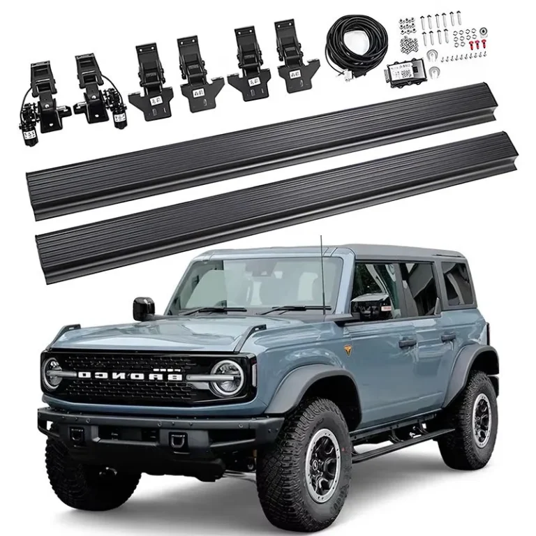 Complete accessory kit including electric boards, wiring, and brackets for ford bronco running boards displayed alongside a blue SUV.